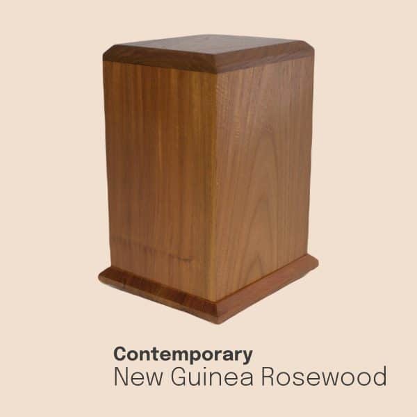 Handcrafted using genuine New Guinea Rosewood, this modern cremation urn has a sleek, vertical design.